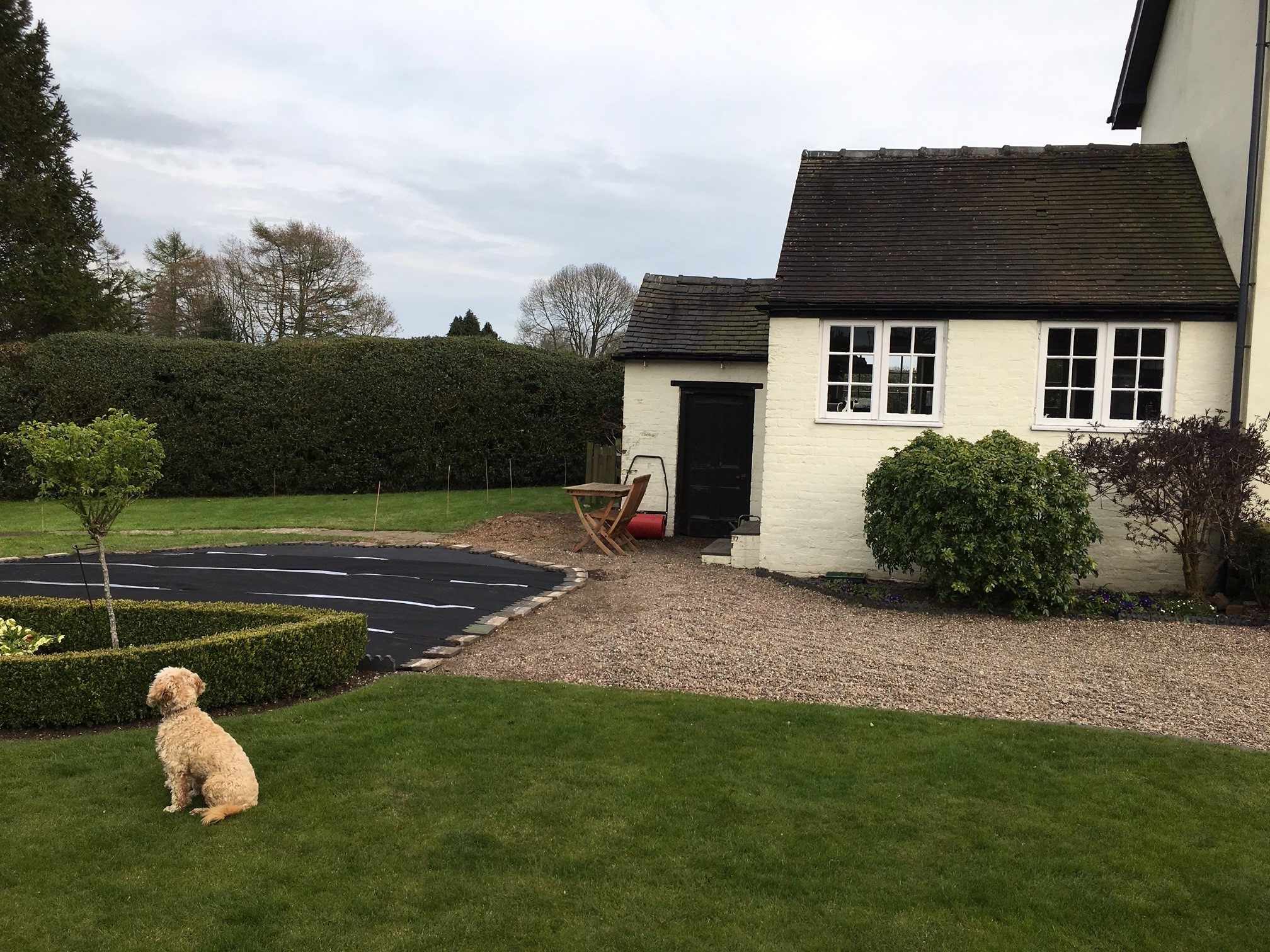 A contemporary glazed extension to a Grade II Listed cottage